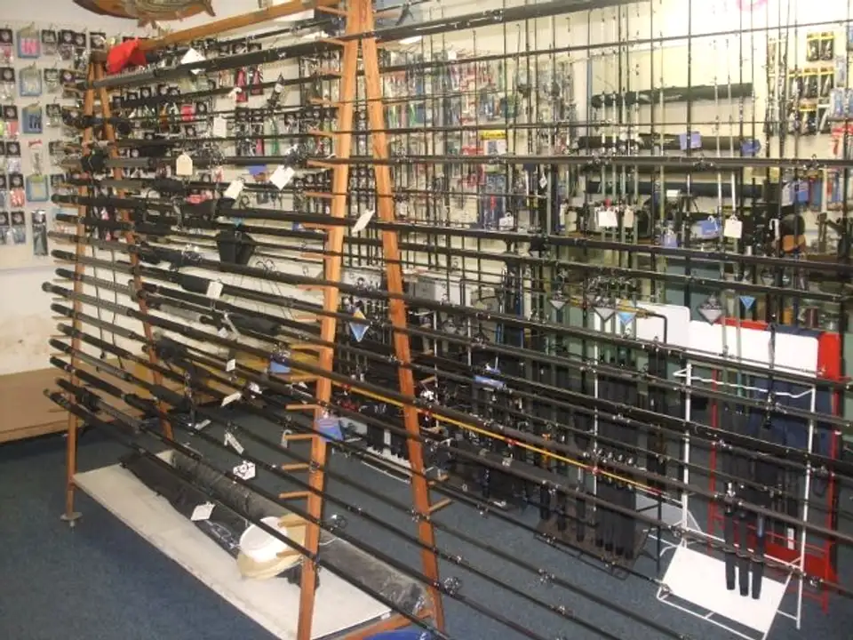 Rows of rods in racks along the shop wall