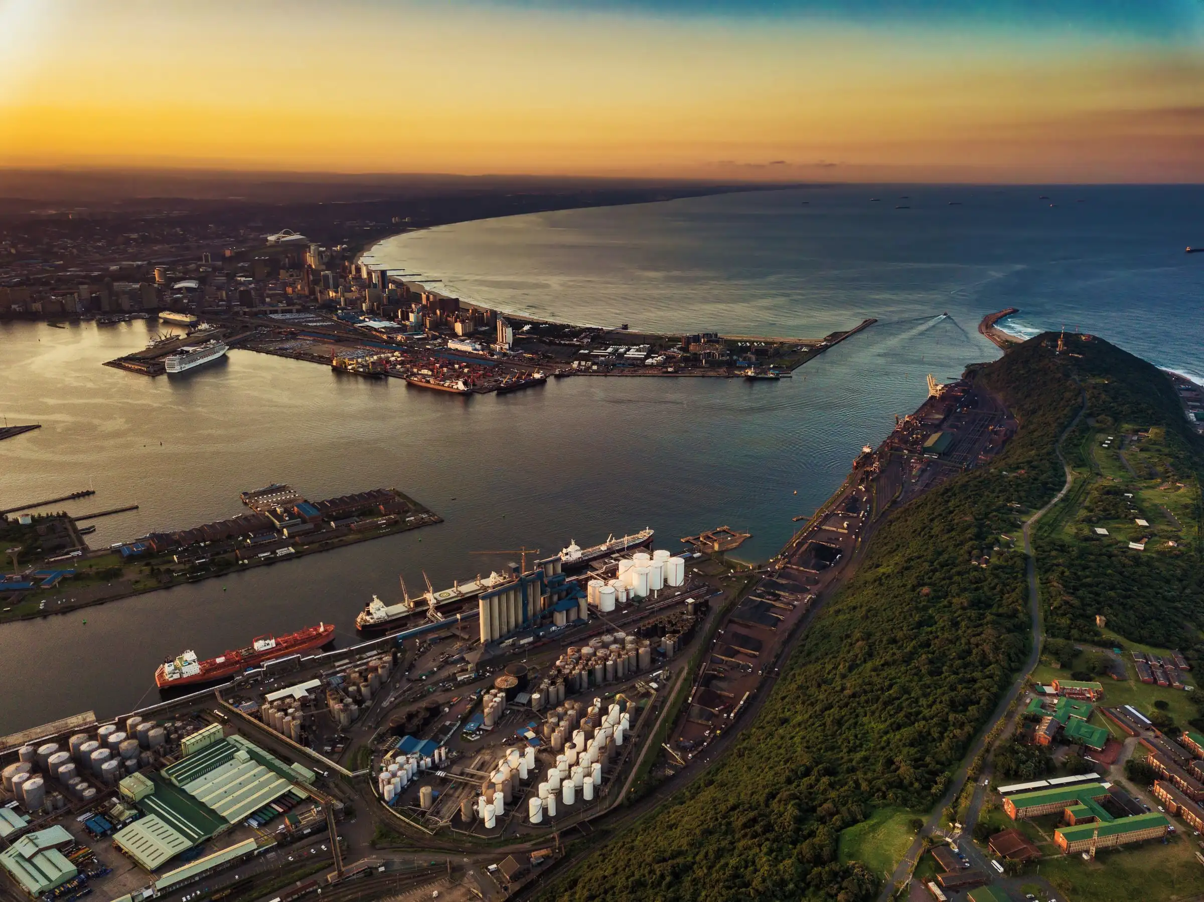An aerial view of the Port of Durban and the Bluff at sunset
